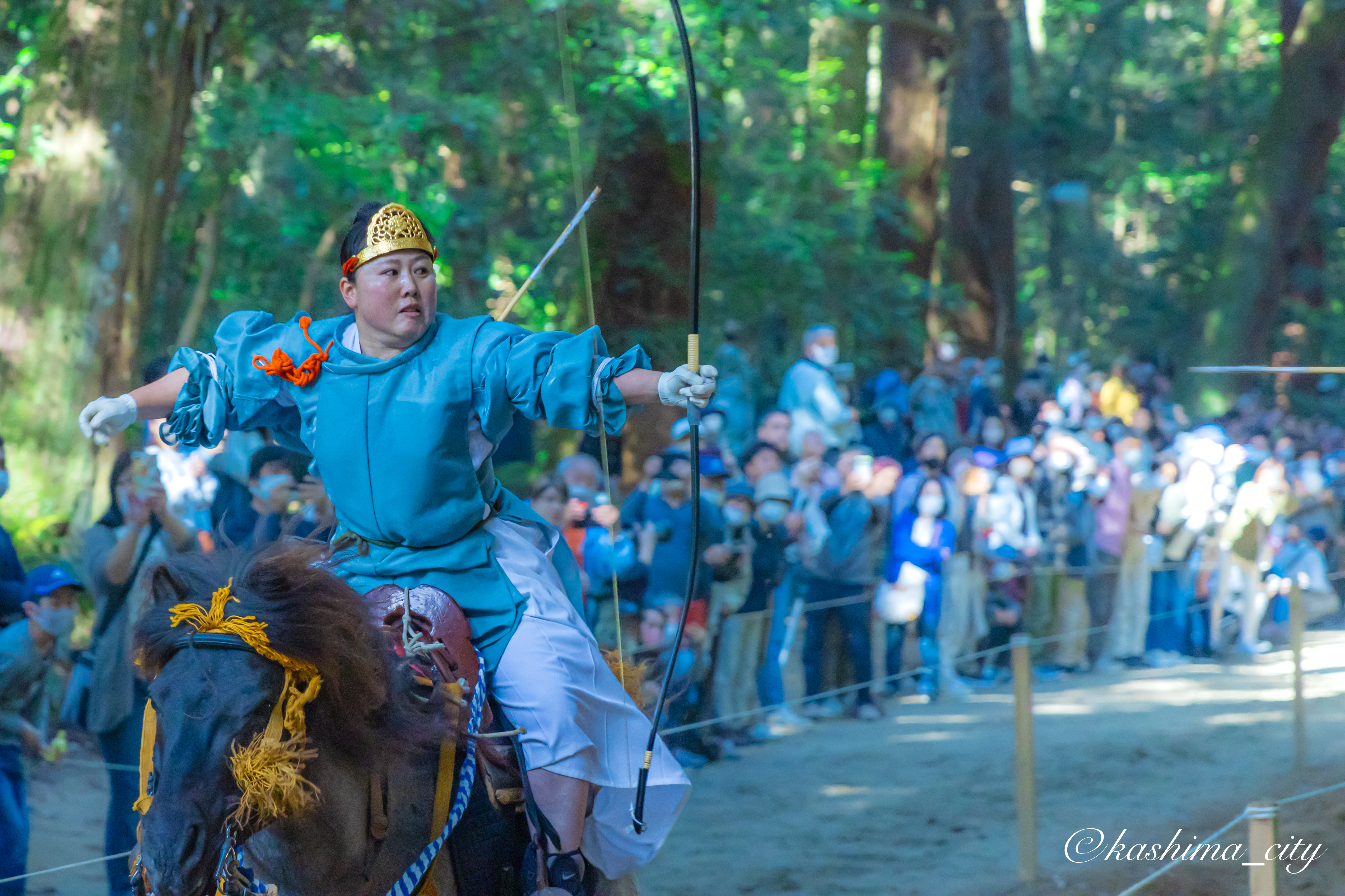 的を射る射手1